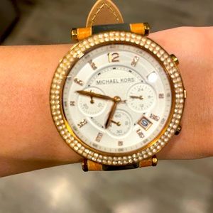 Michael Kors rose gold watch.